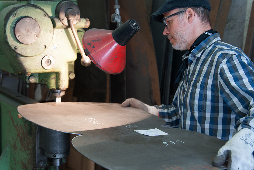 Peter Preisig cutting the steel for the cow bell.