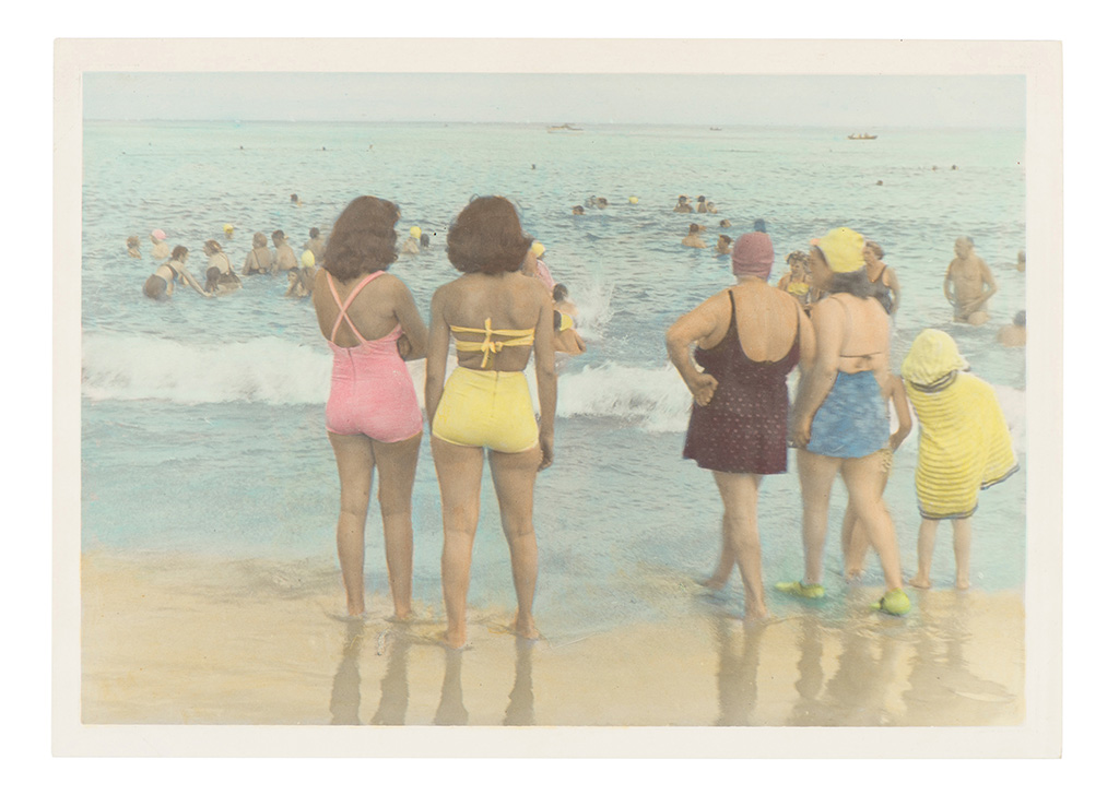 People bathing at the sea shore.