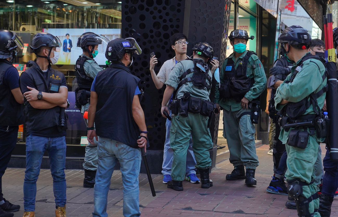 POlice in Hong Kong with a protestor