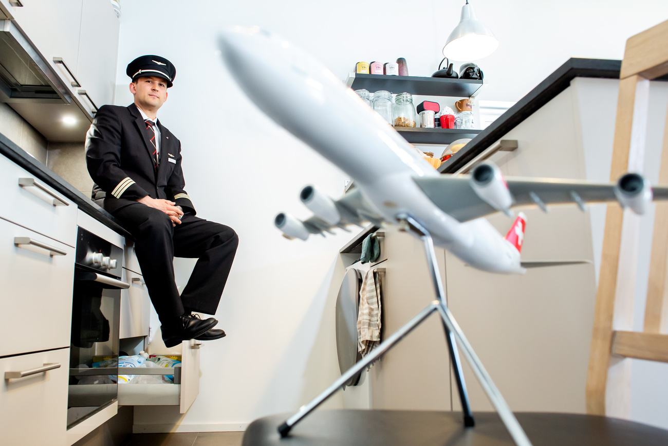 pilot grounded at home with model aeroplane