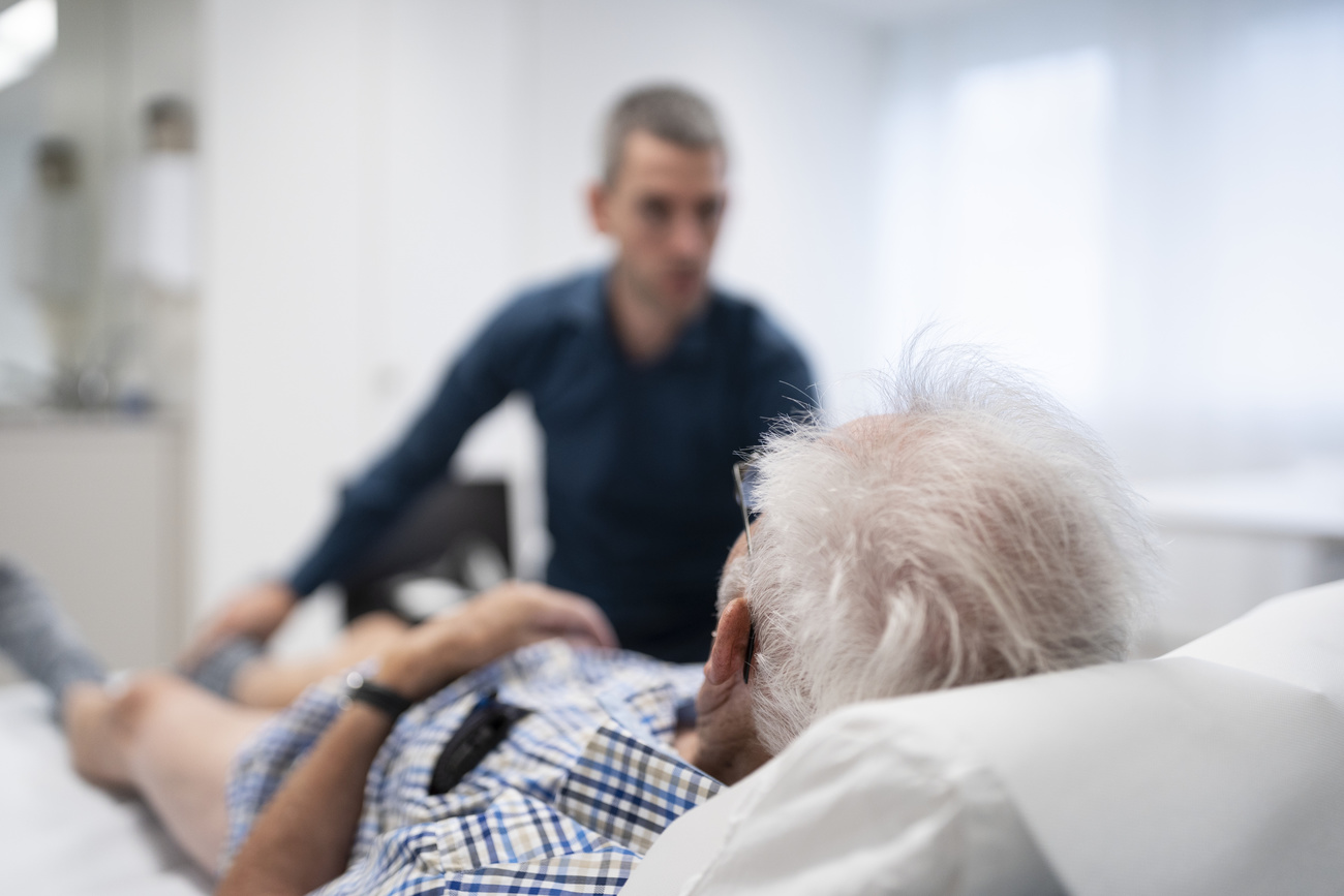 Doctor with elderly patient