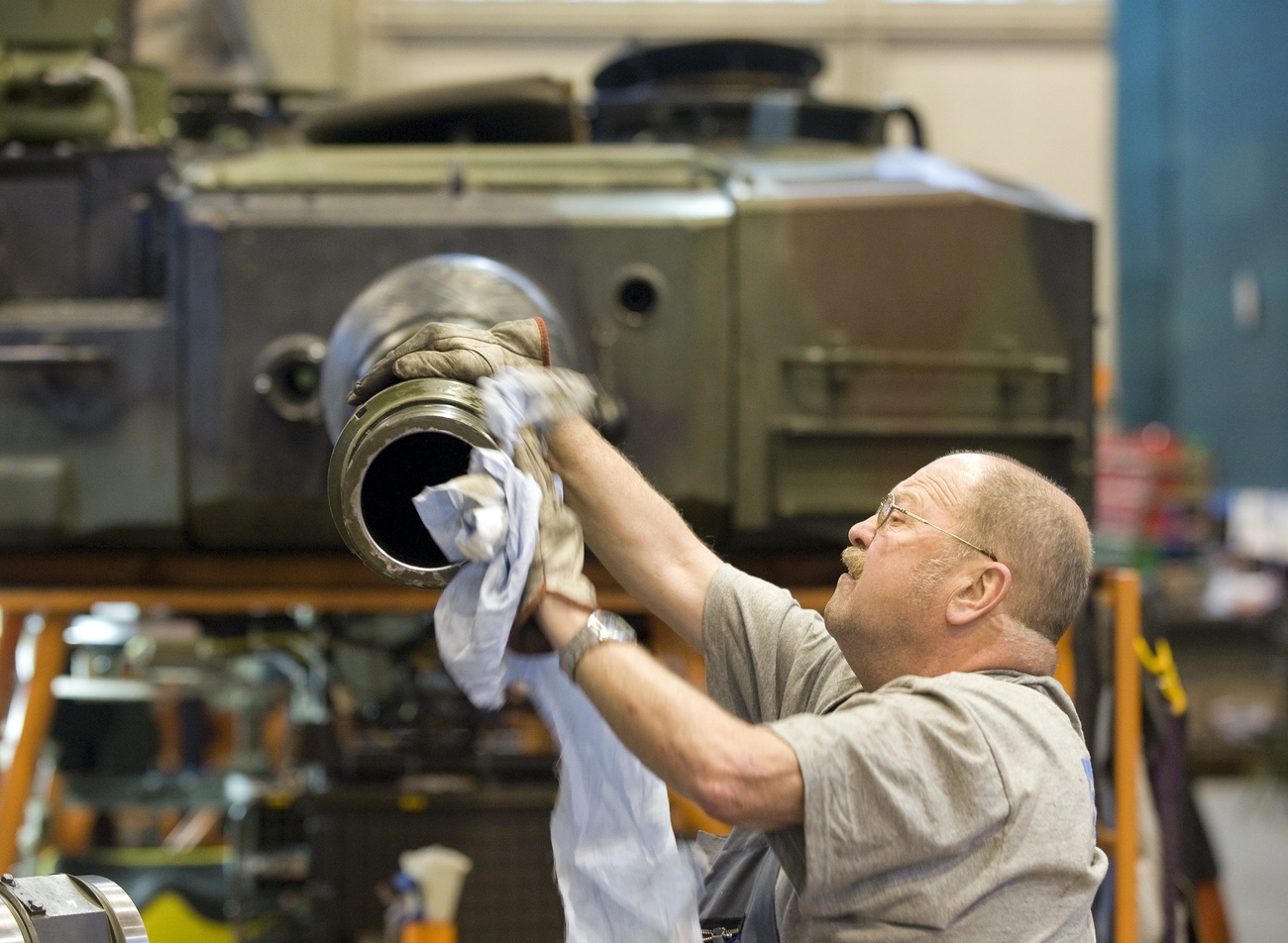 Worker in an tank factory
