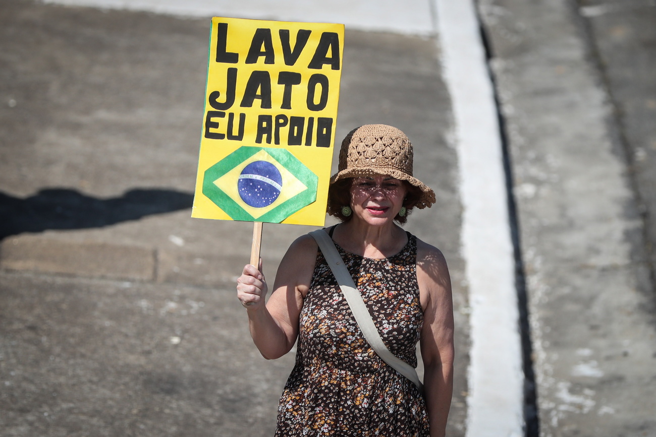 A woman holds a placard during a rally in Sao Paulo, Brazil.