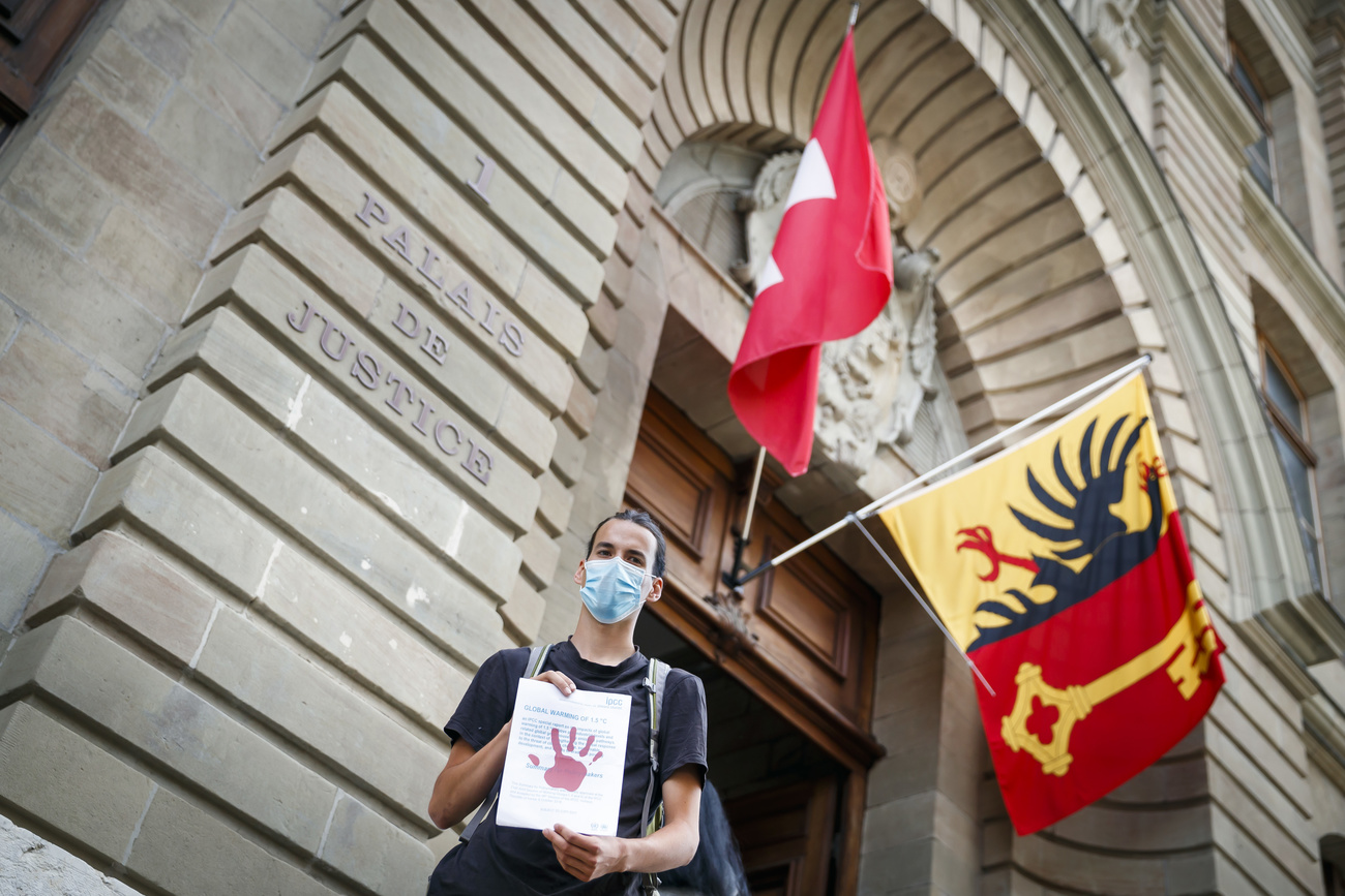 Climate activist outside court building in Geneva