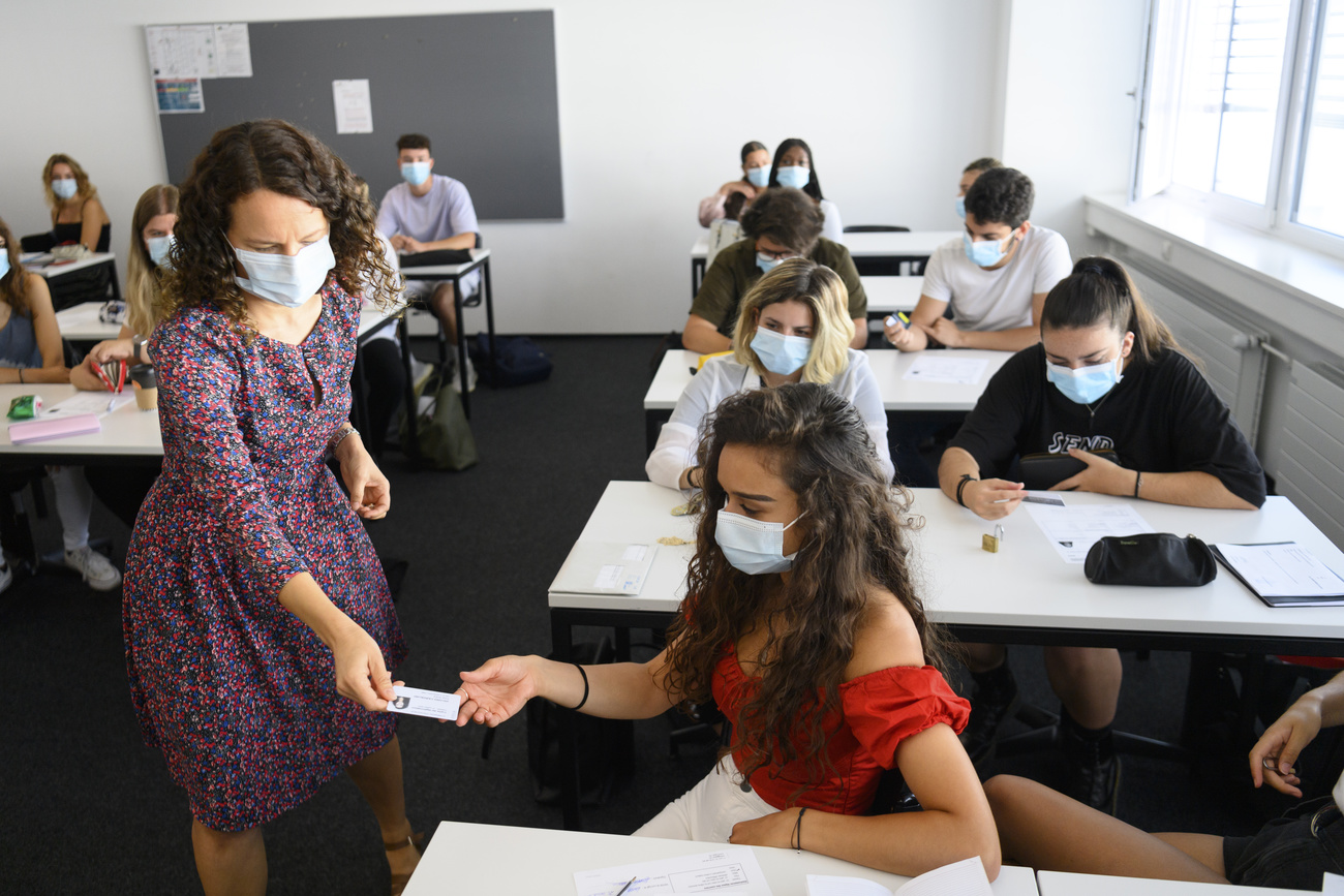 school teacher and pupil in masks