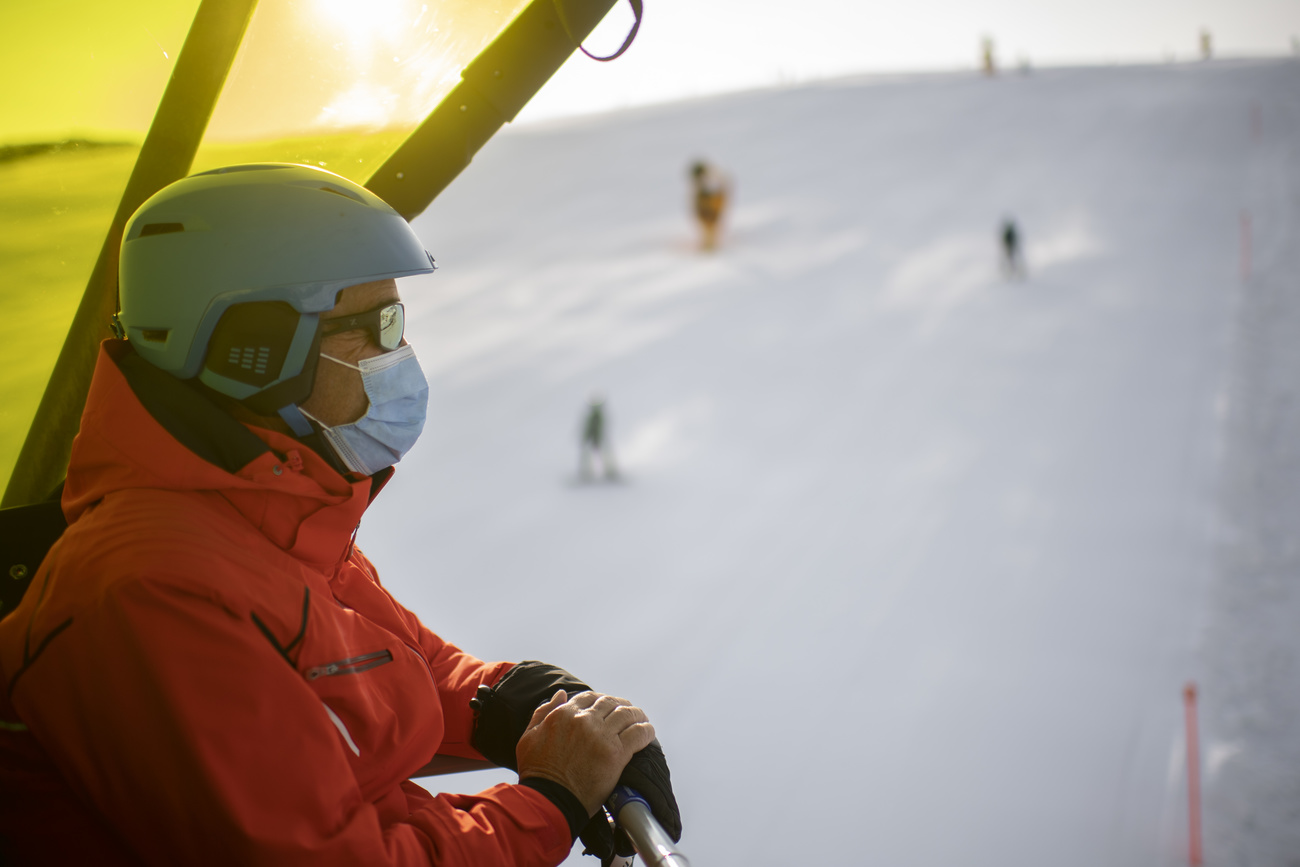 A skier on a lift in Davos on October 25, 2020.