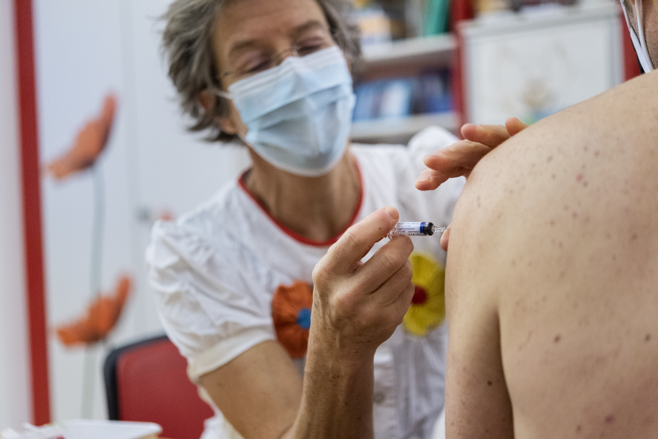 Doctor administering a vaccine