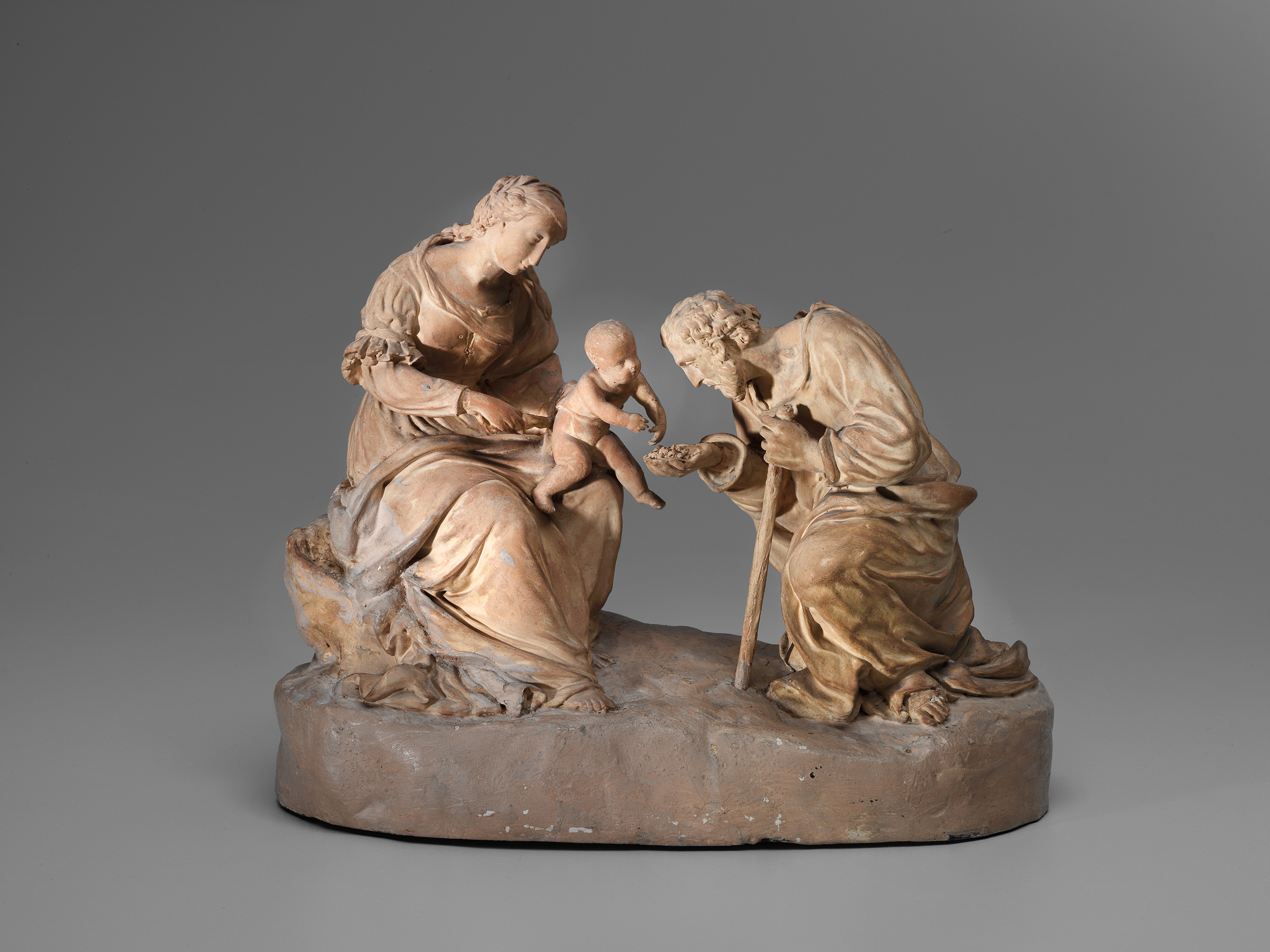 Figurine d argilla che raffigurano Maria, un pastore e i Bambin Gesù.