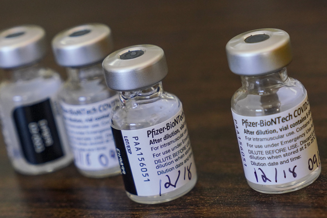 Four glass vials