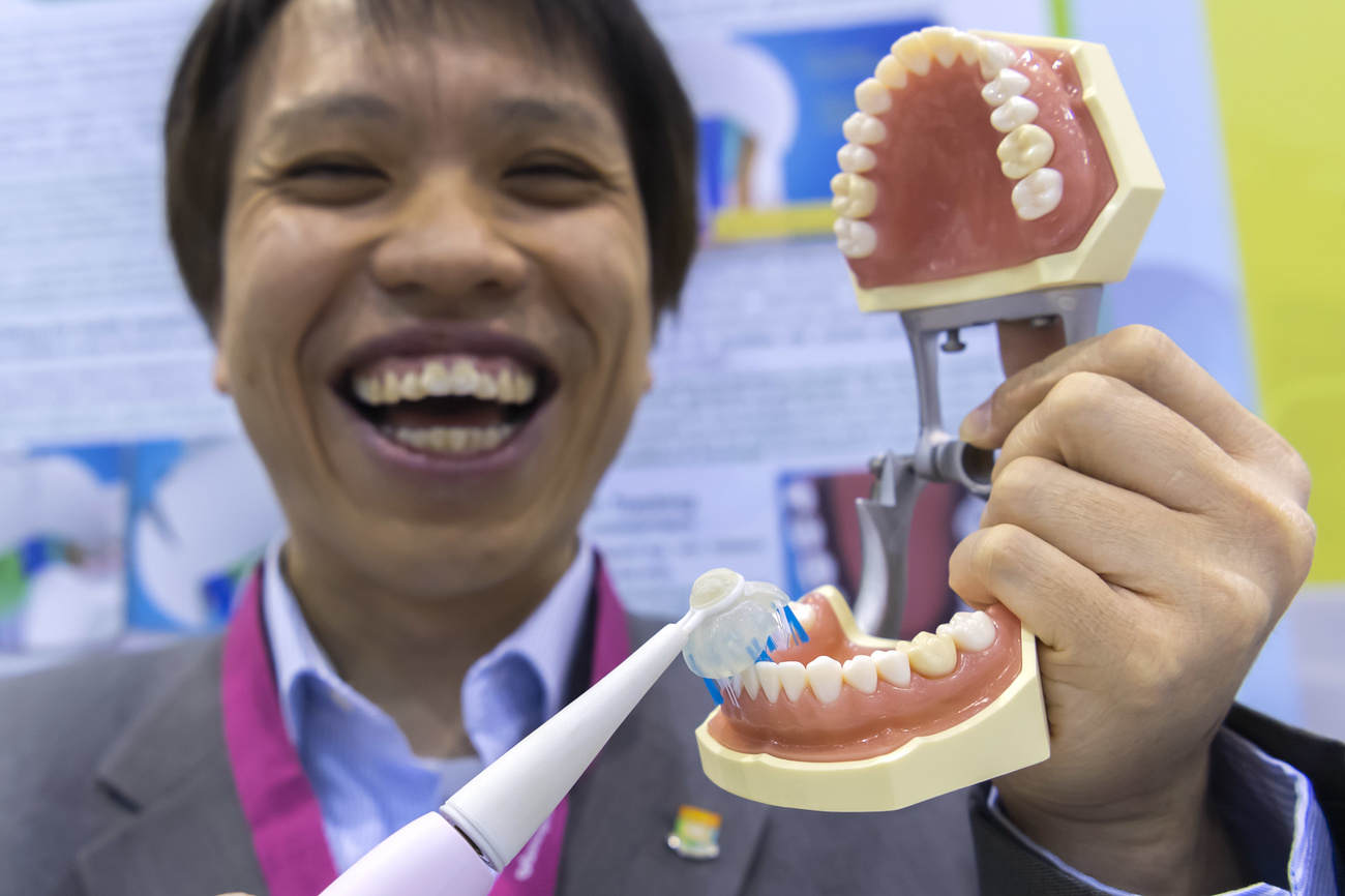 Inventor holding his toothbrush