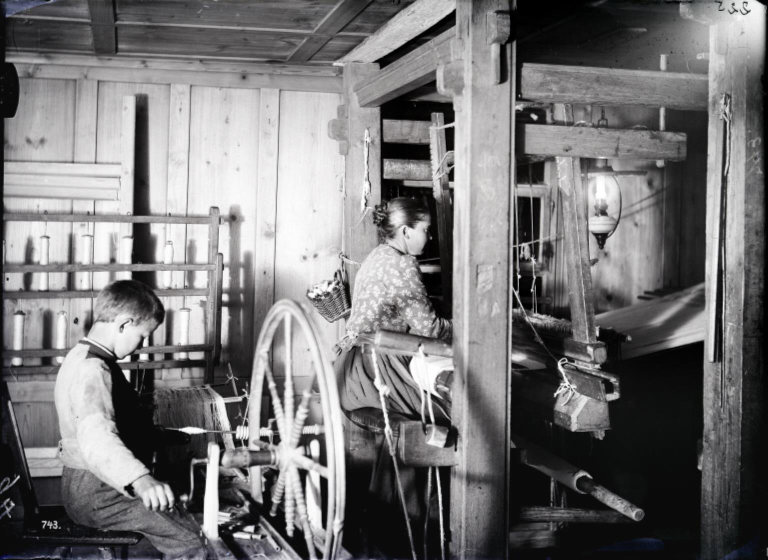 Woman and child weaving