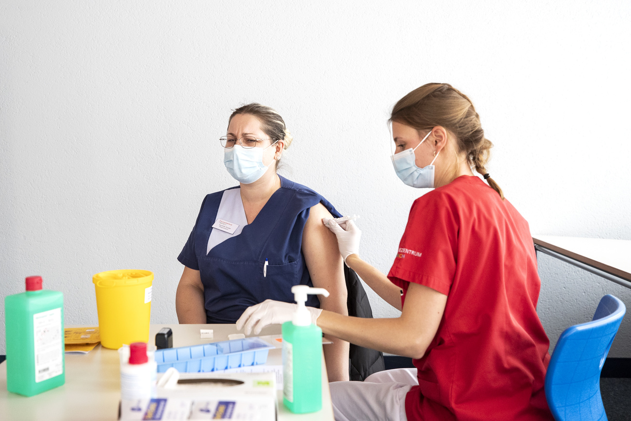 Nurse applying a vaccination