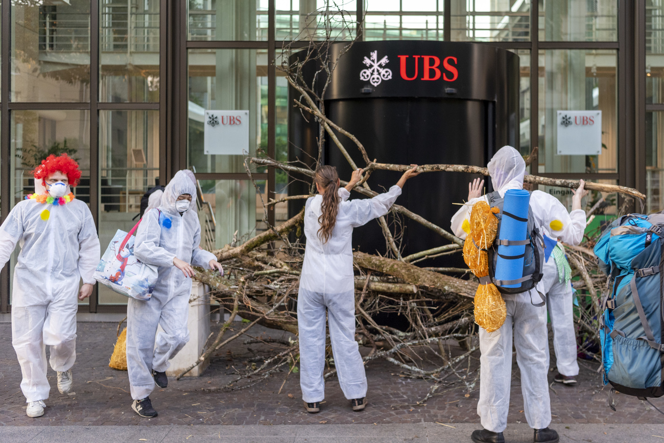 activists protesting outside UBS in 2019