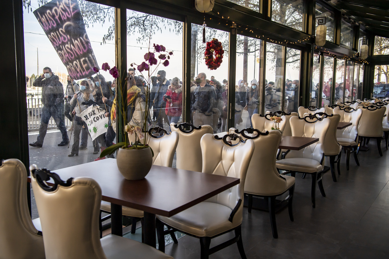 marchers past empty restaurant