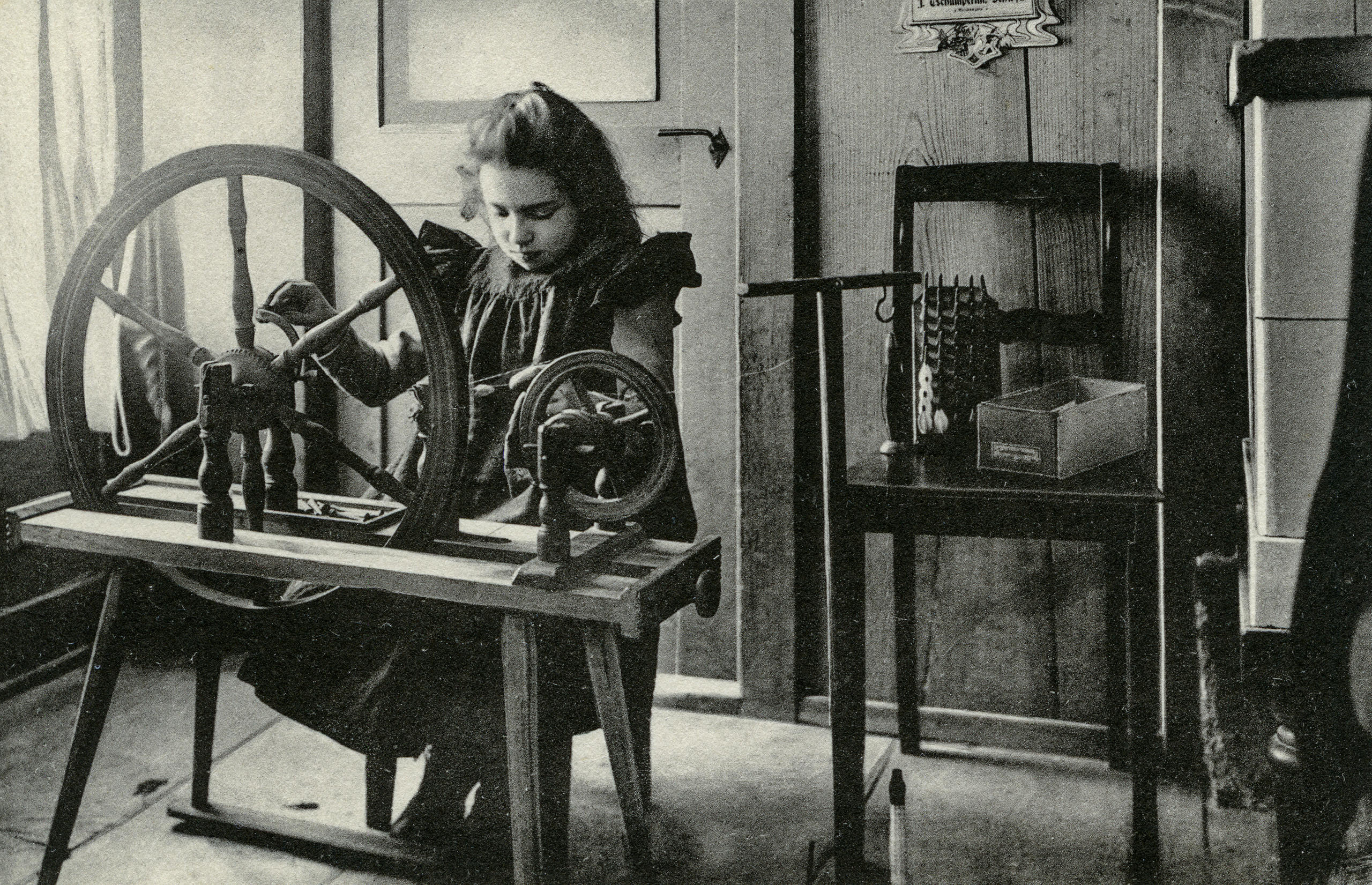 Girl with spinning wheel