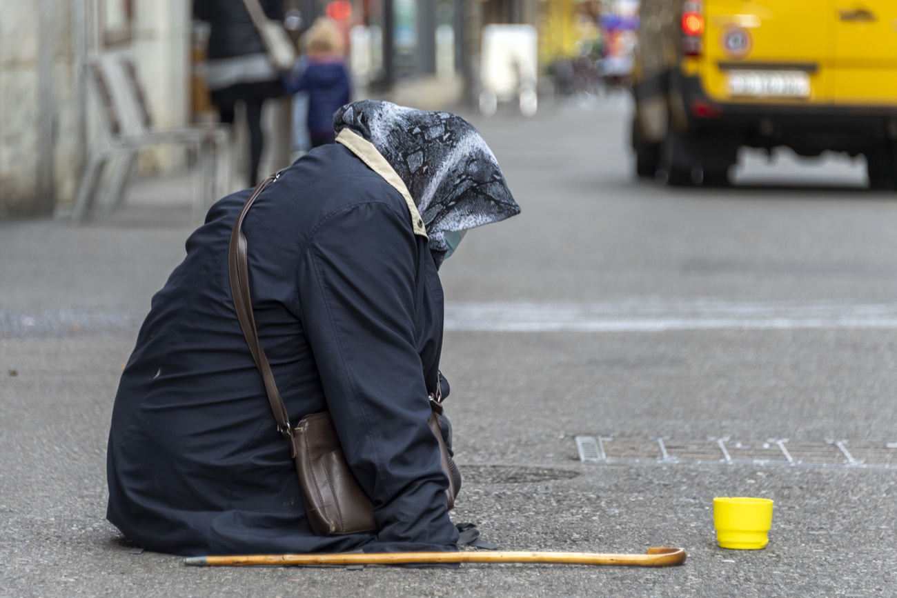 personne en train de mendier