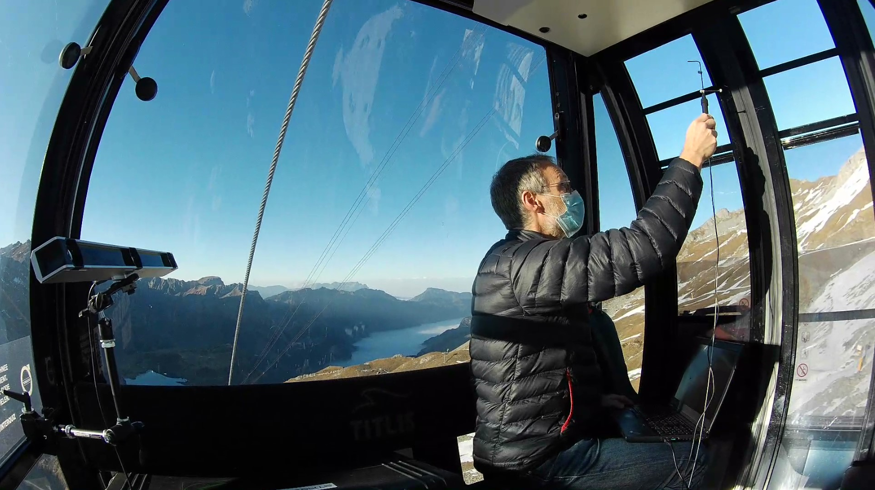 A researcher measures the cabin airflow using air pressure sensors.