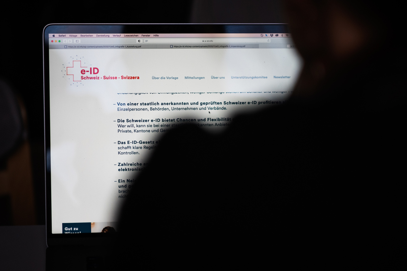 Profile of a person in front of computer screen