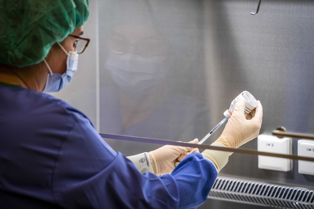 Researcher testing Curevac Covid-19 vaccine.
