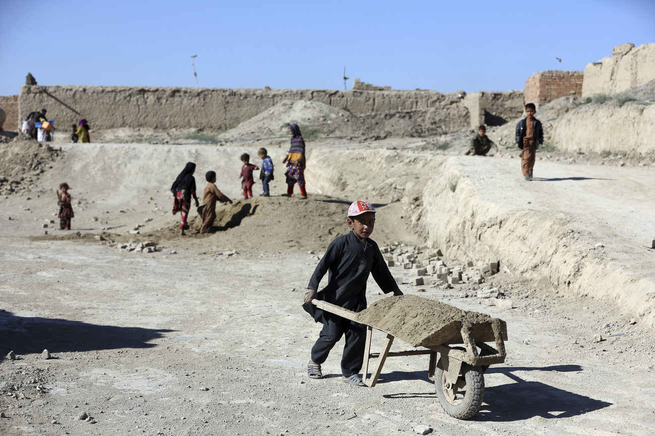 Afghan children working on a construction site