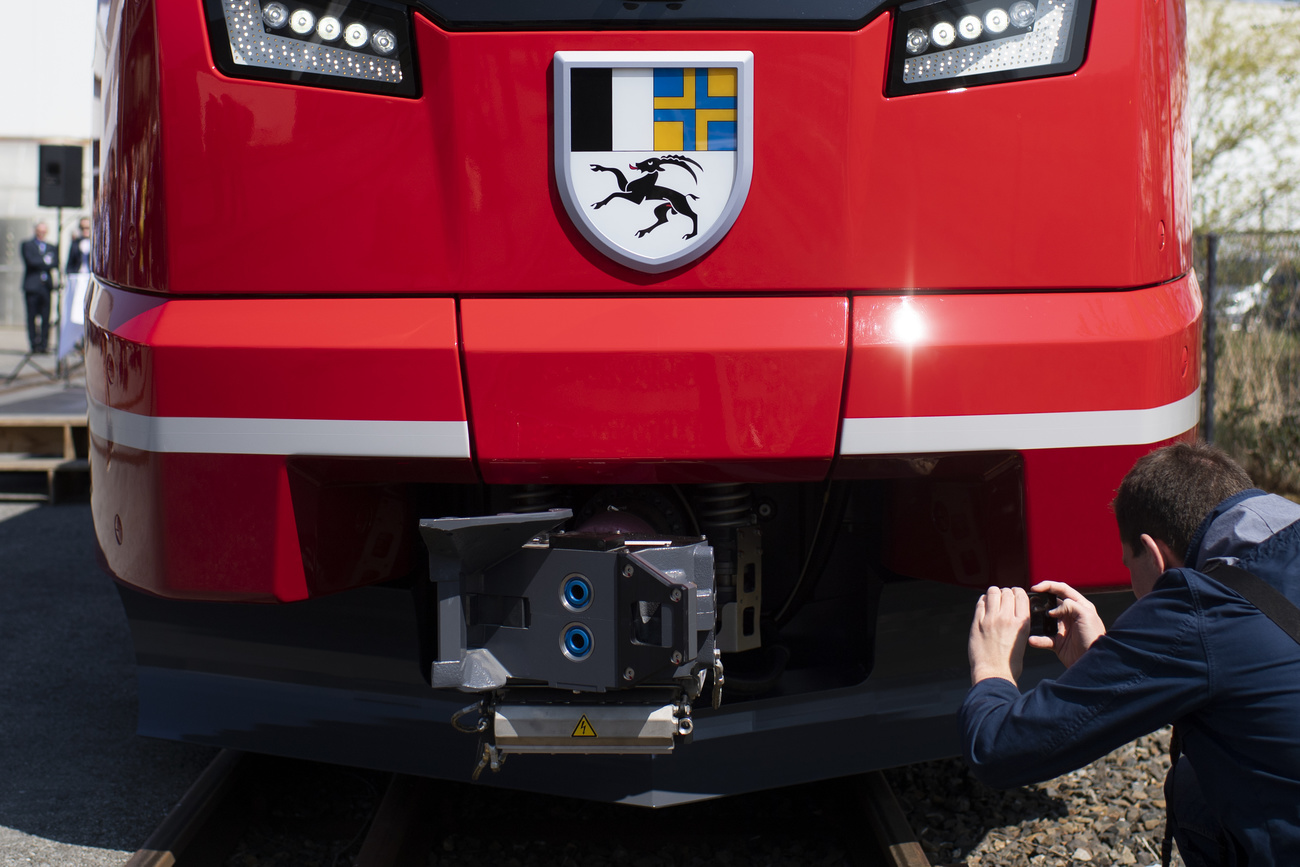 Man photographing a train