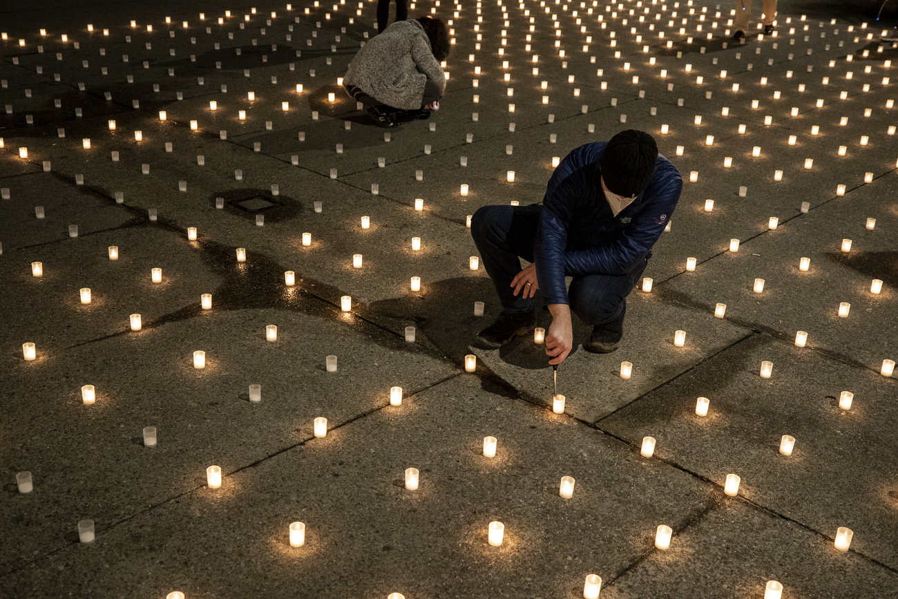 Man lighting a candle