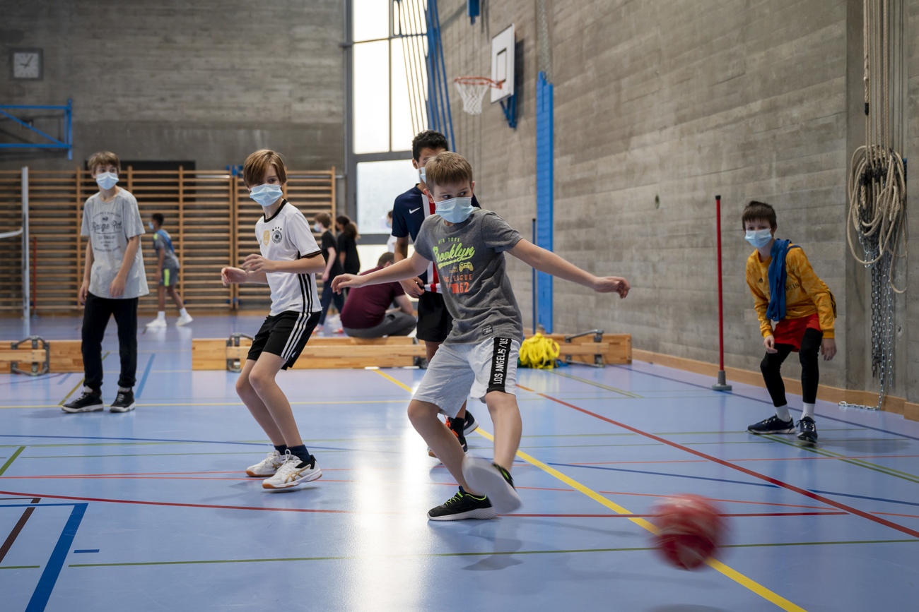 children playing football
