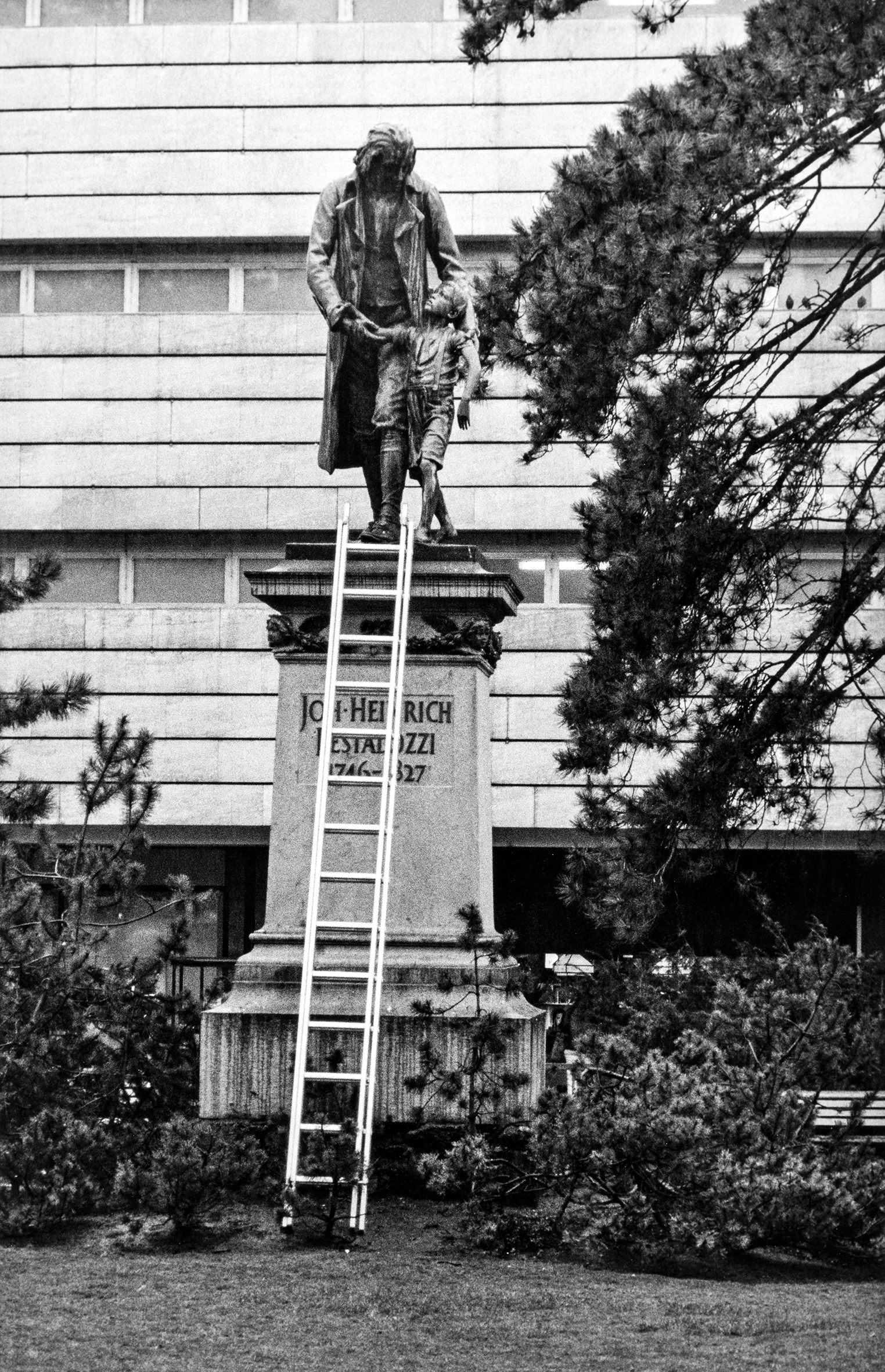 Pestalozzi statue with leaning ladder