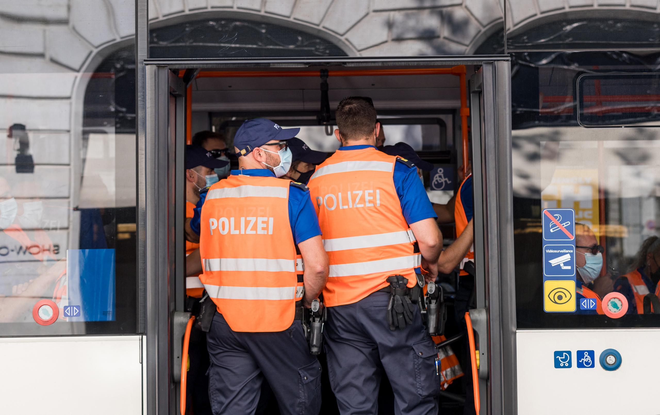 Police presence on public transport in Geneva.