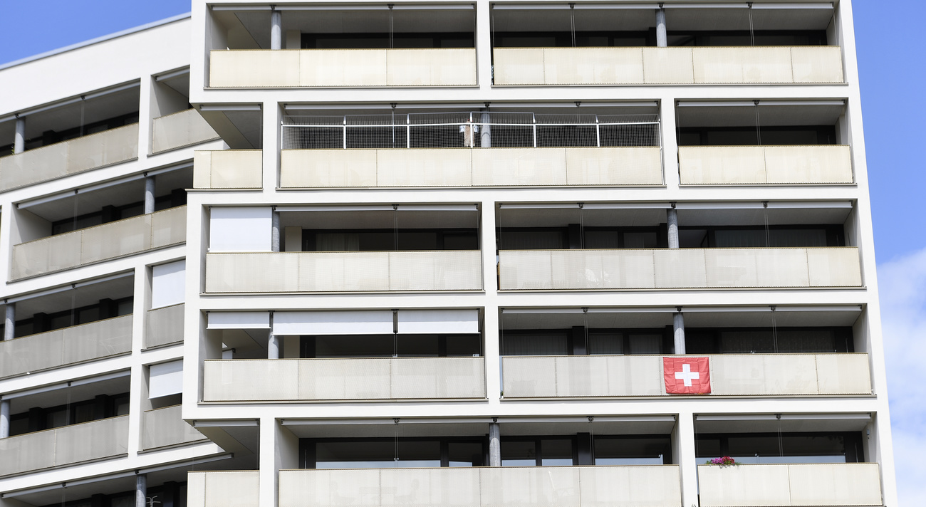 building with Swiss flag