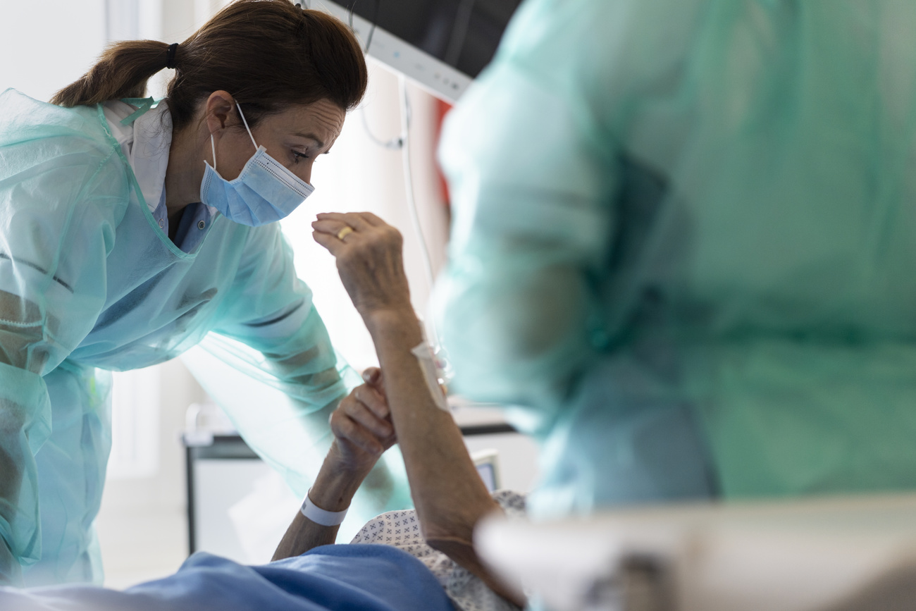 Doctor attending to a hospital patient