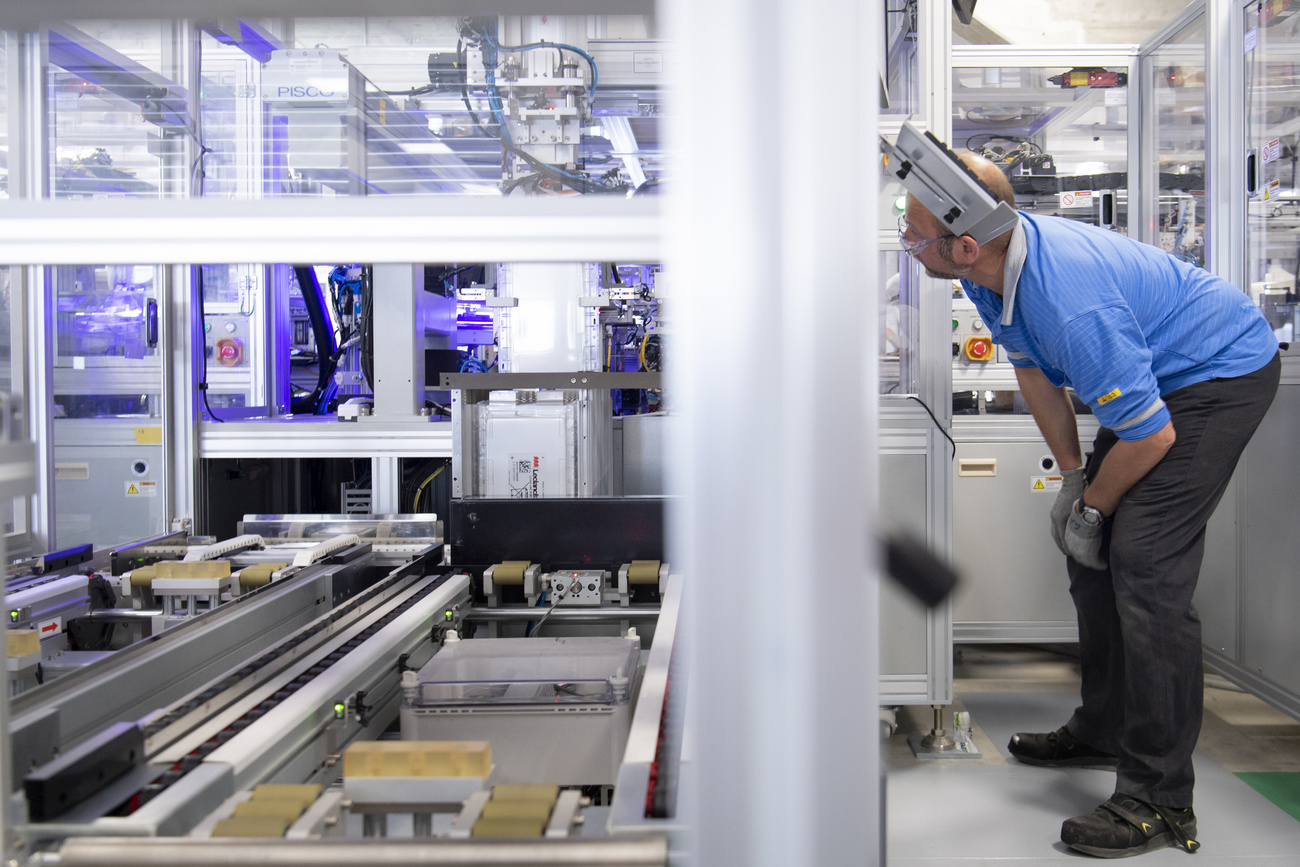 A worker assembles a battery in the Leclanche factory at Yverdon-les-Bains.