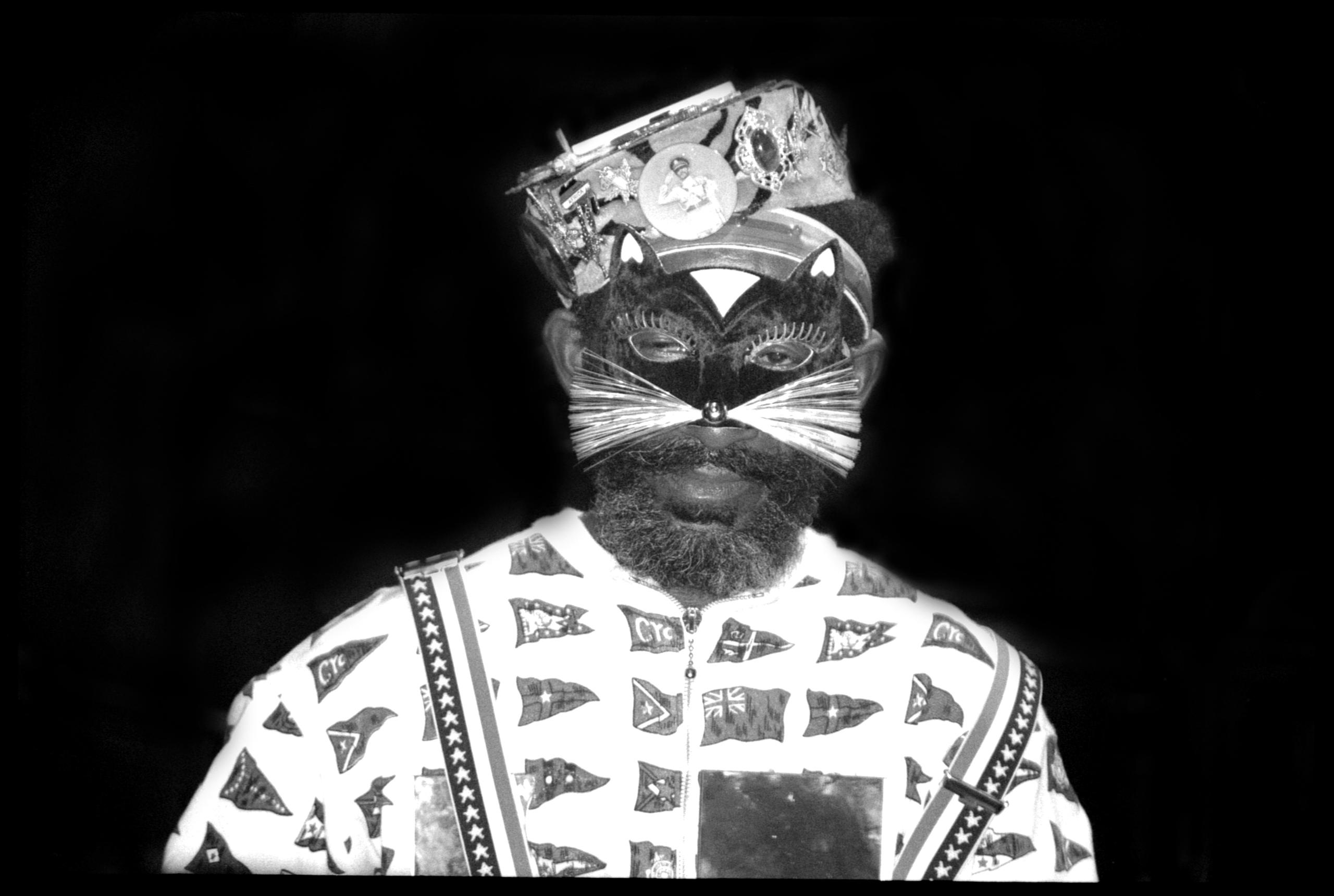 lee scratch perry with mask