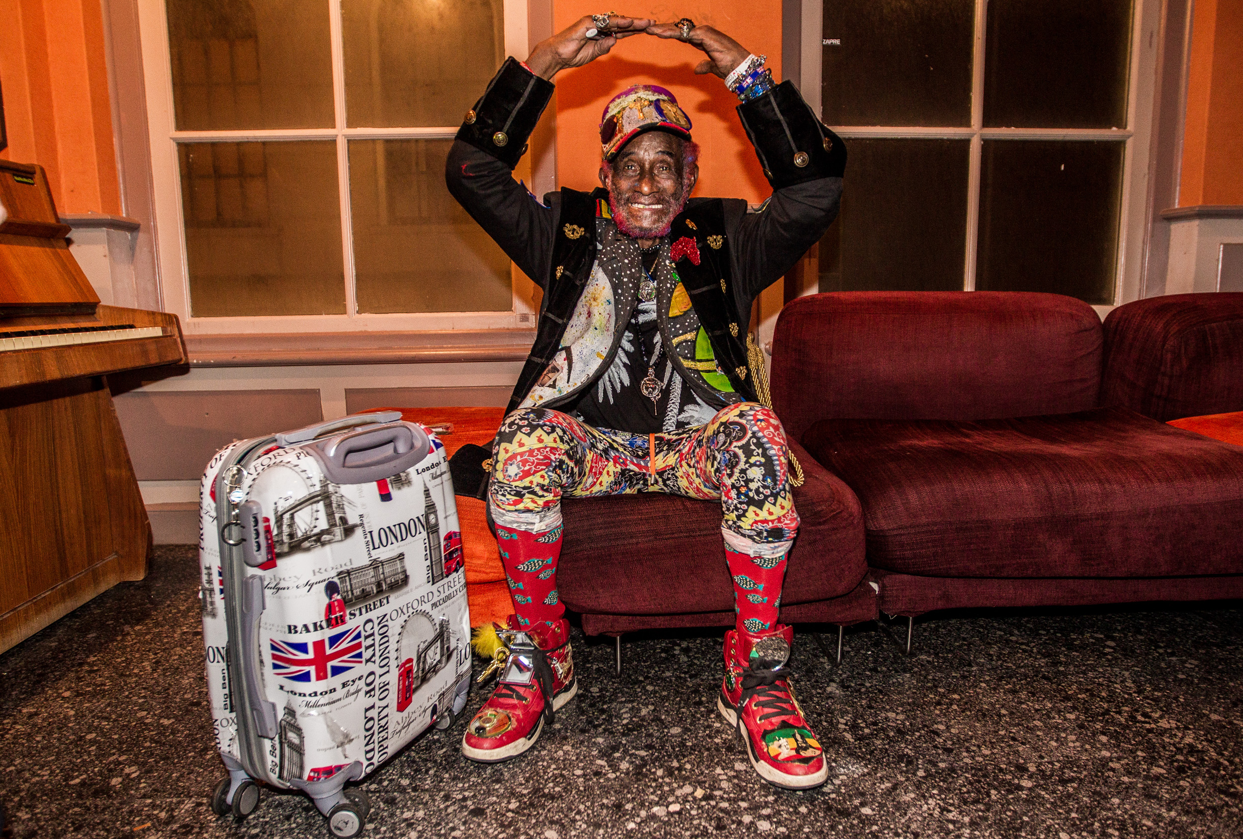 lee perry with suitcase