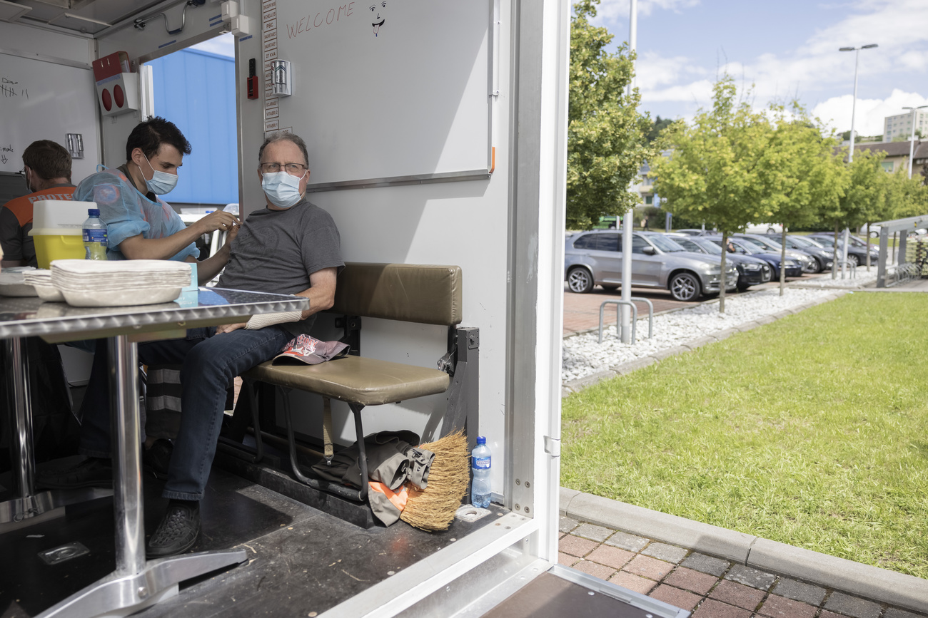 Man receiving Covid vaccine