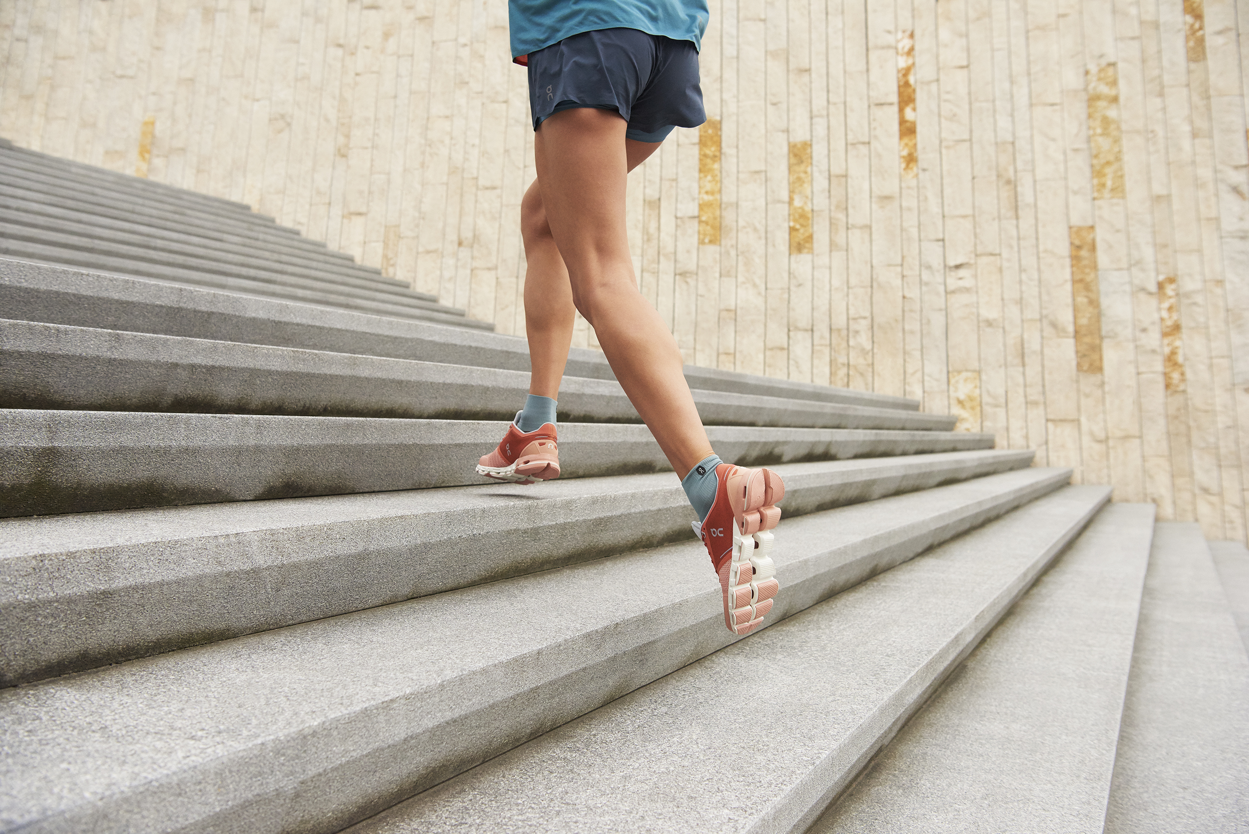 Man running up steps