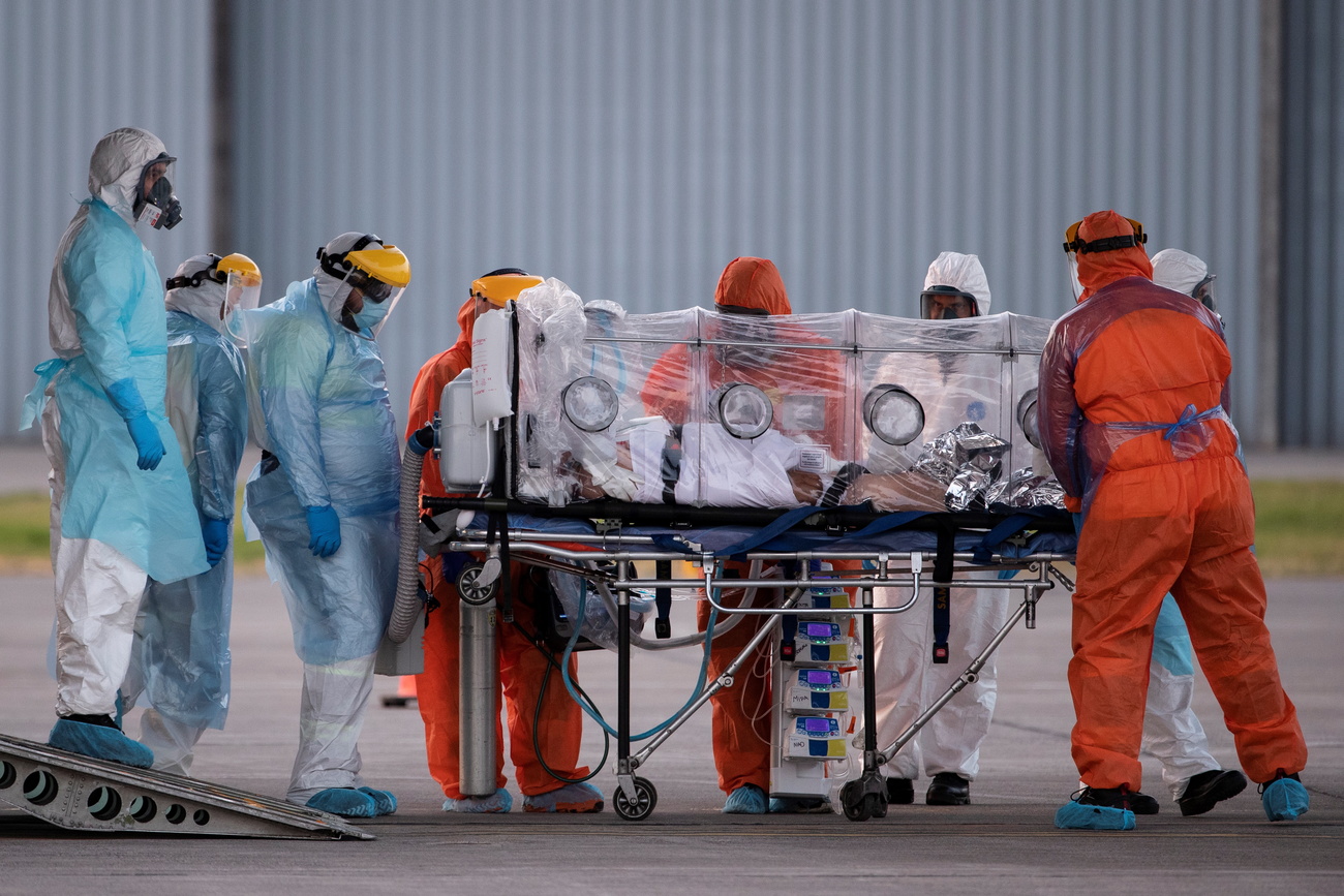 A covid patient being transferred