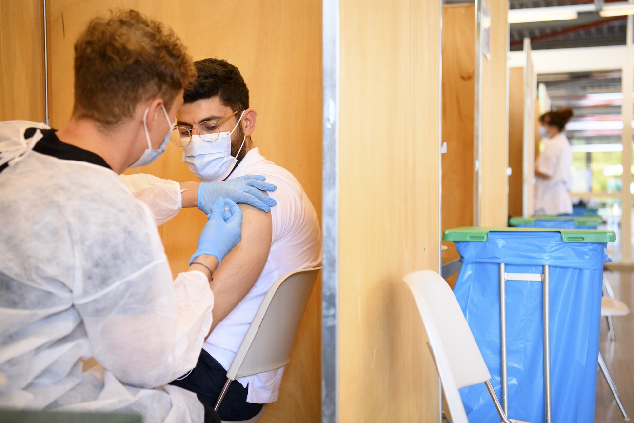 Man receiving Covid vaccine