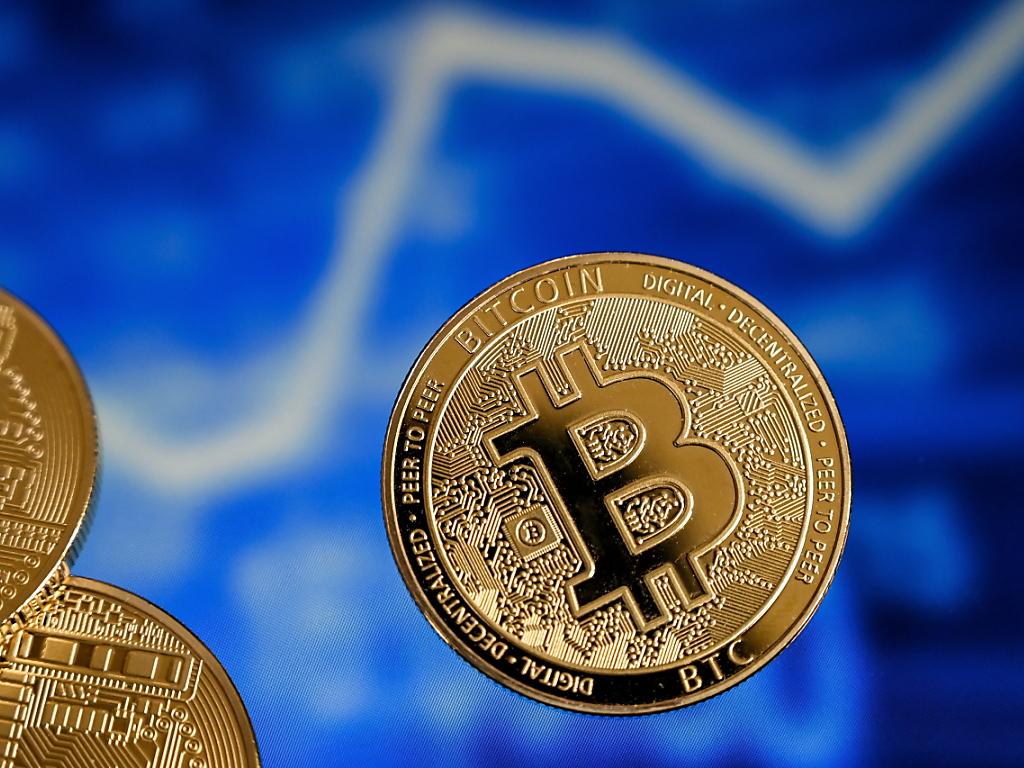 Le bitcoin monnaie légale au Salvador en dépit des critiques - SWI  swissinfo.ch