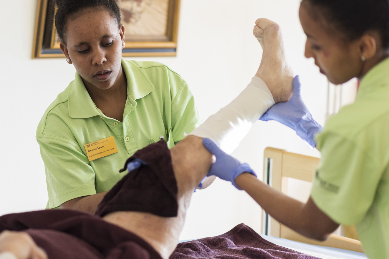 nurses with a patient