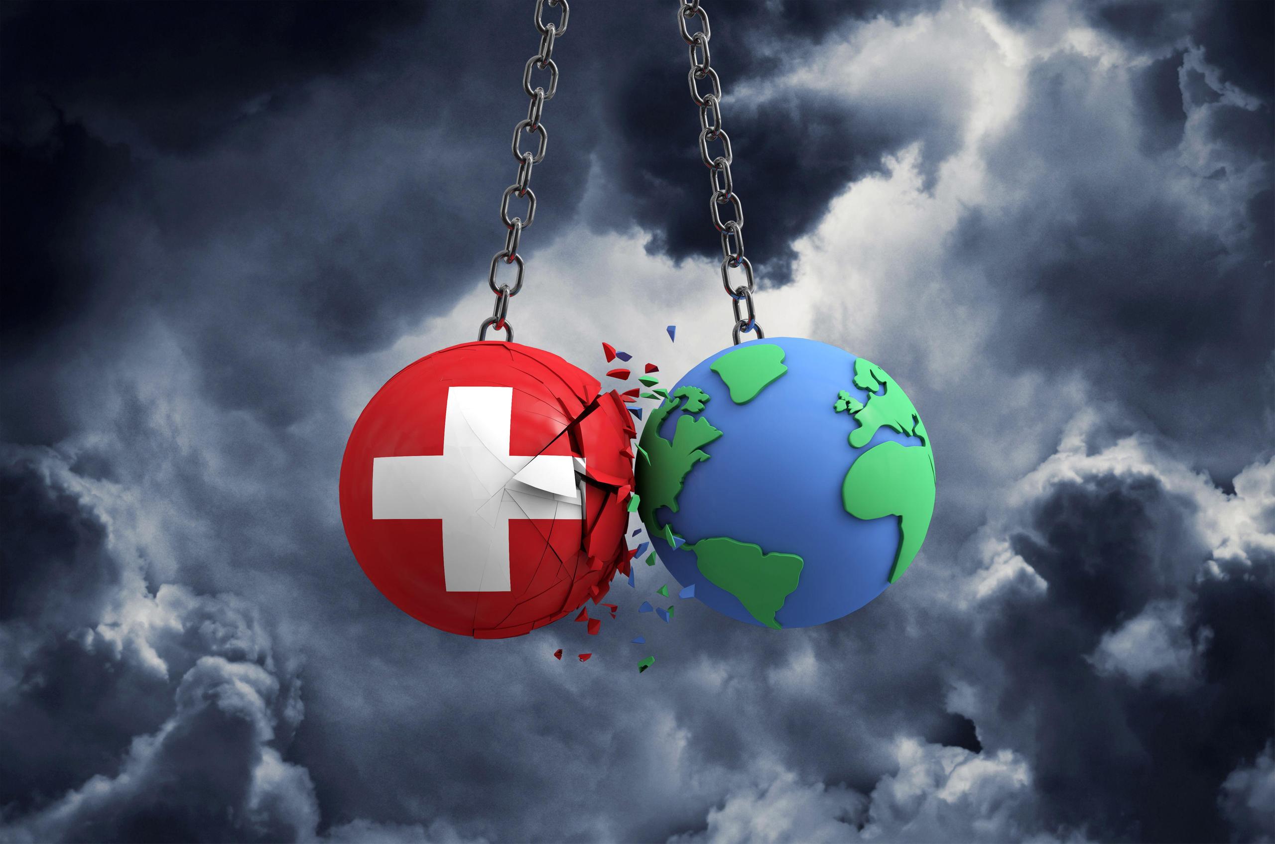Zwei Kugeln: eine mit den Farben der Schweiz, die andere als Symbol für den Planeten Erde prallen aufeinander.