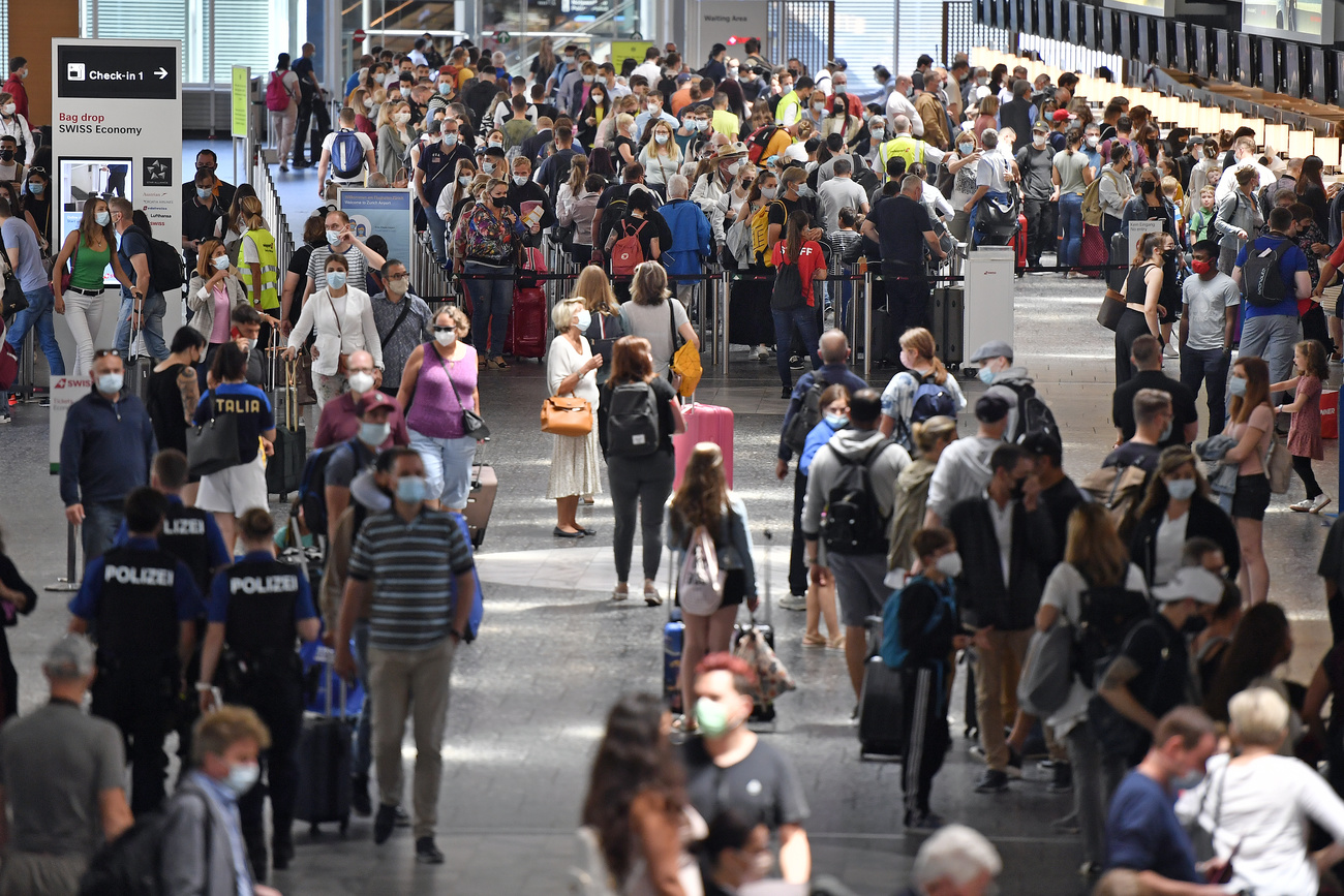 Zurich Airport passengers queuing up.