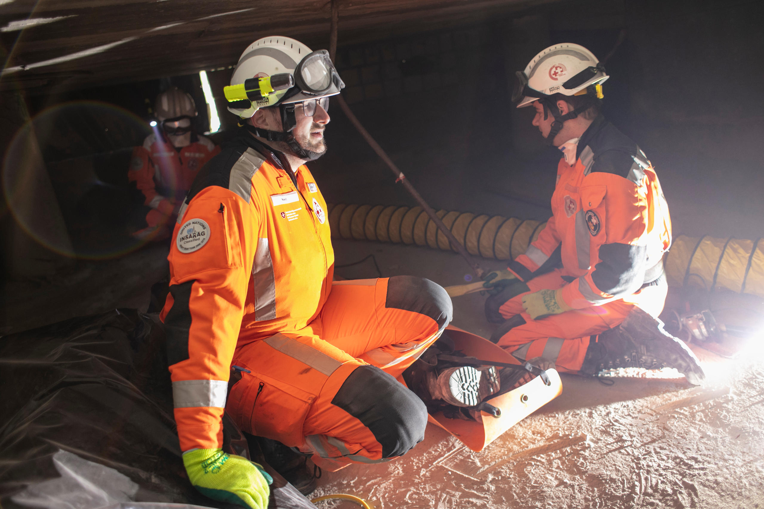 Rescue work inside collapsed building