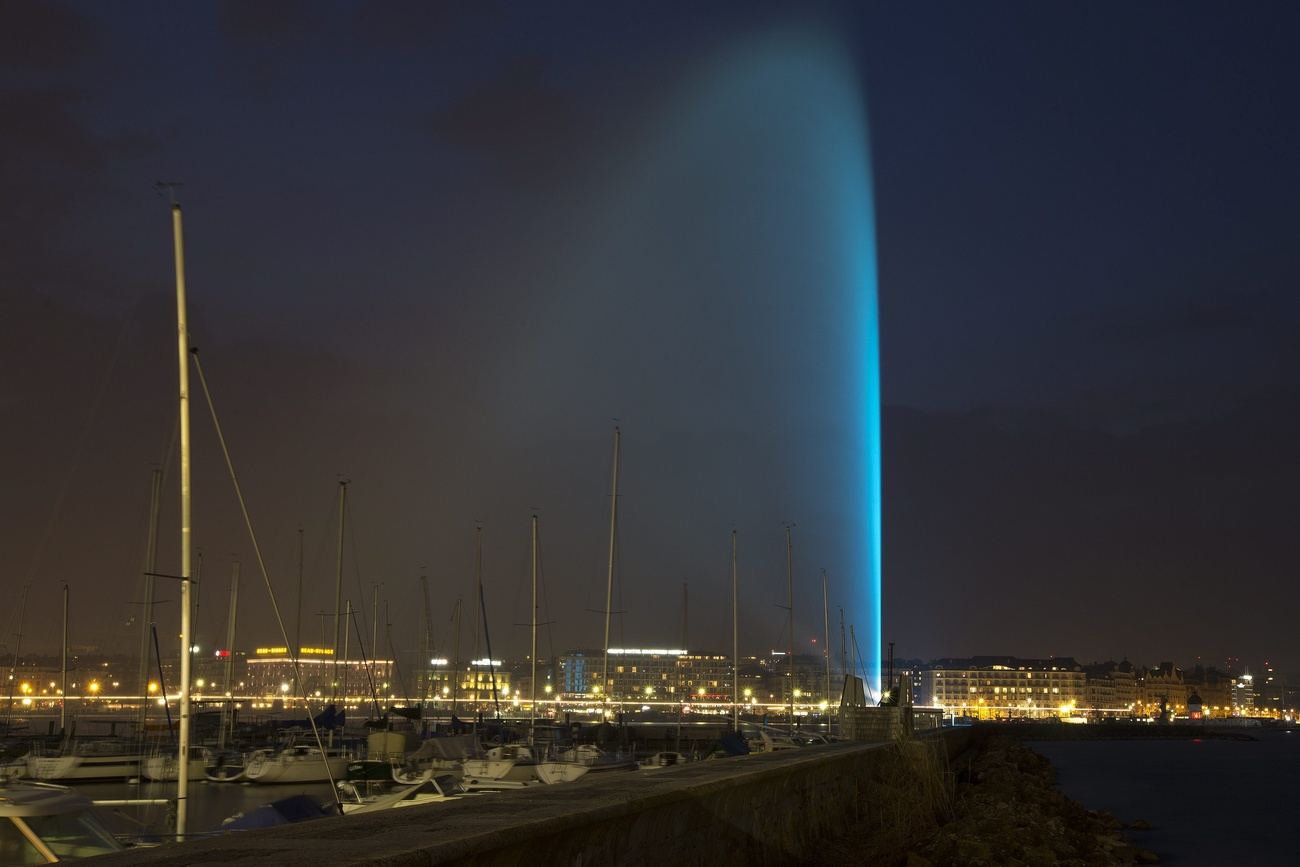 lights in Geneva with the famous water jet illuminated blue