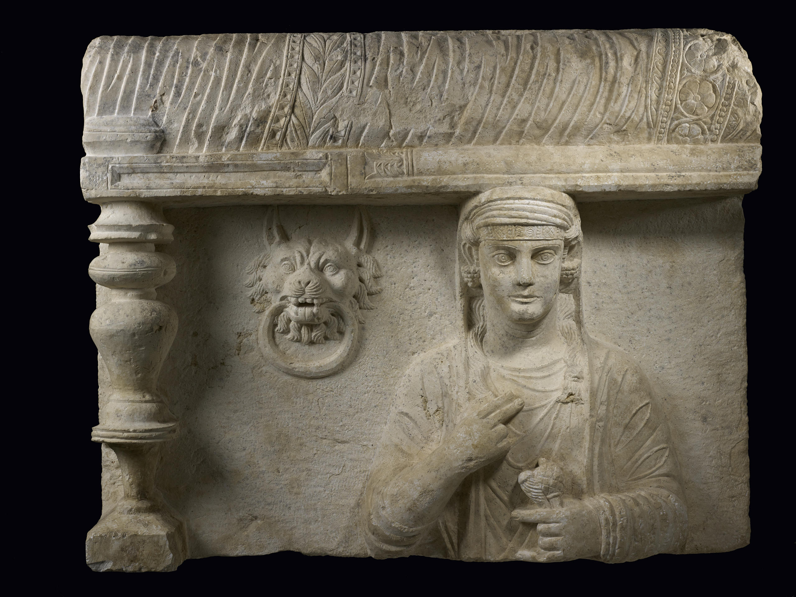 A funereal bas-relief with a female portrait from Syria, 2nd century BC.