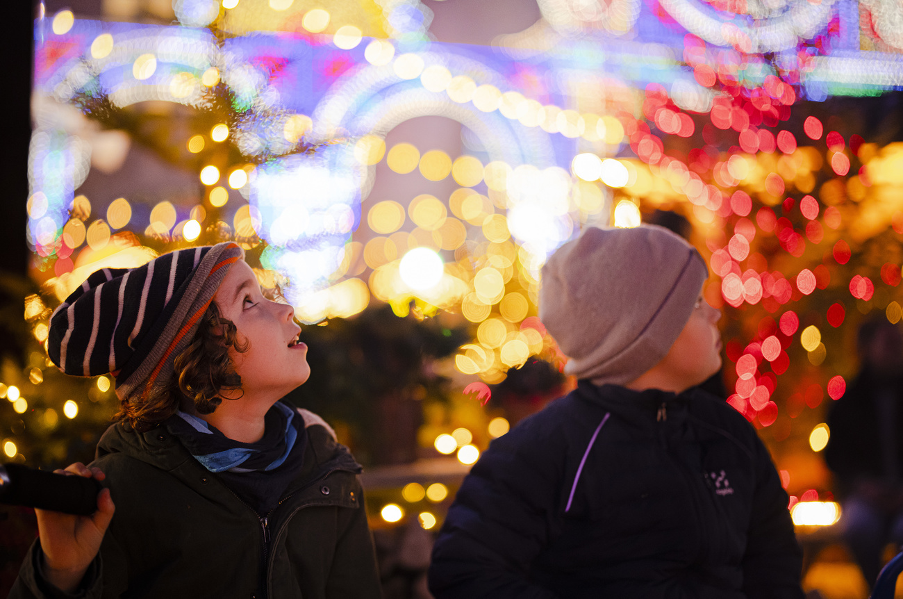 Kids look at light festival at Landesmuseum in Zurich.