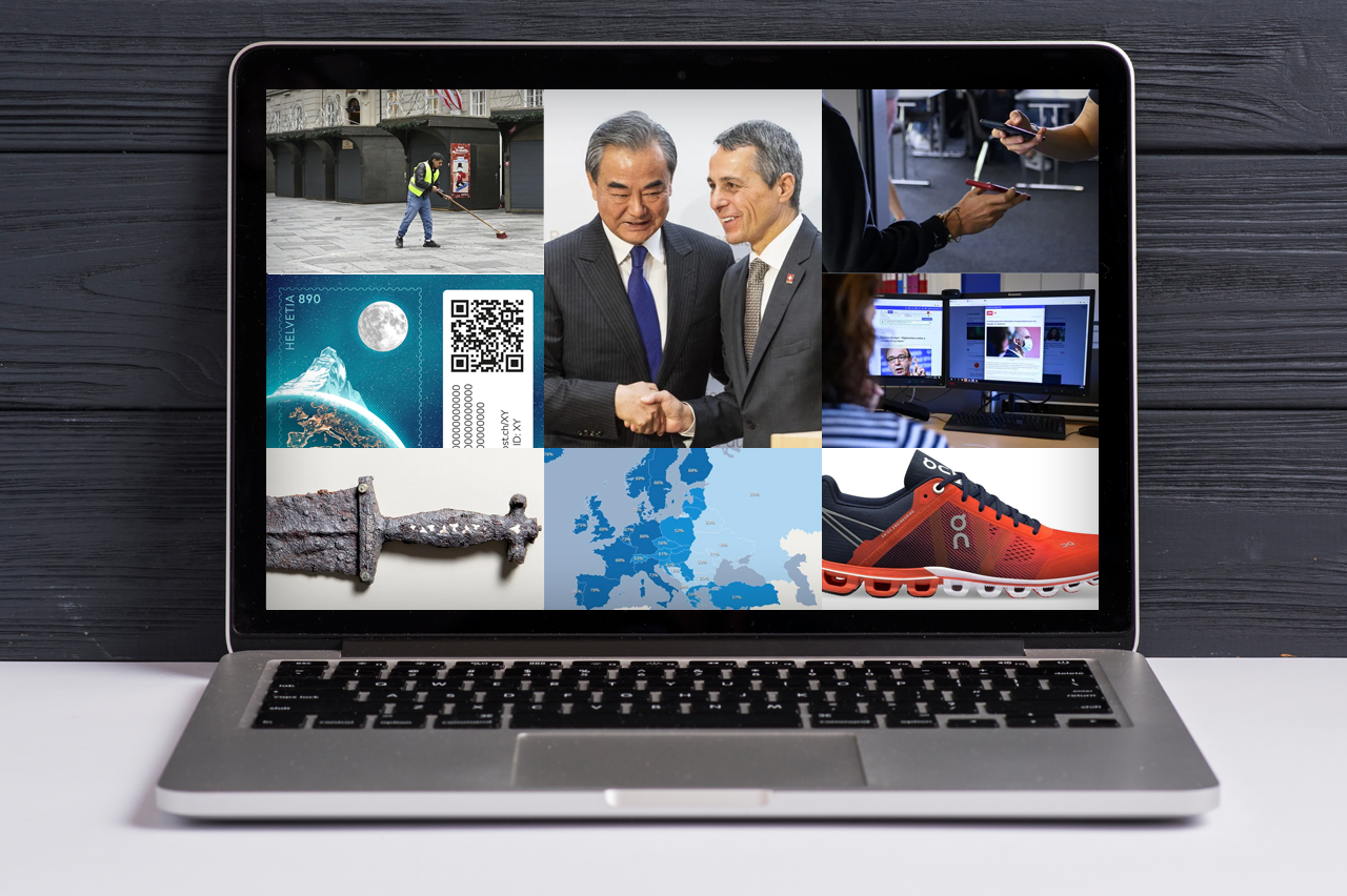 Aufgeklappter Laptop mit acht verschiedenen Bildern zu acht unterschiedlichen Inhalten von swissinfo