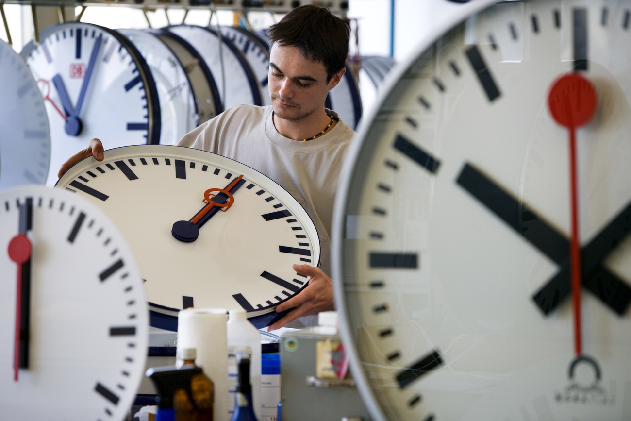 Man looking at watches