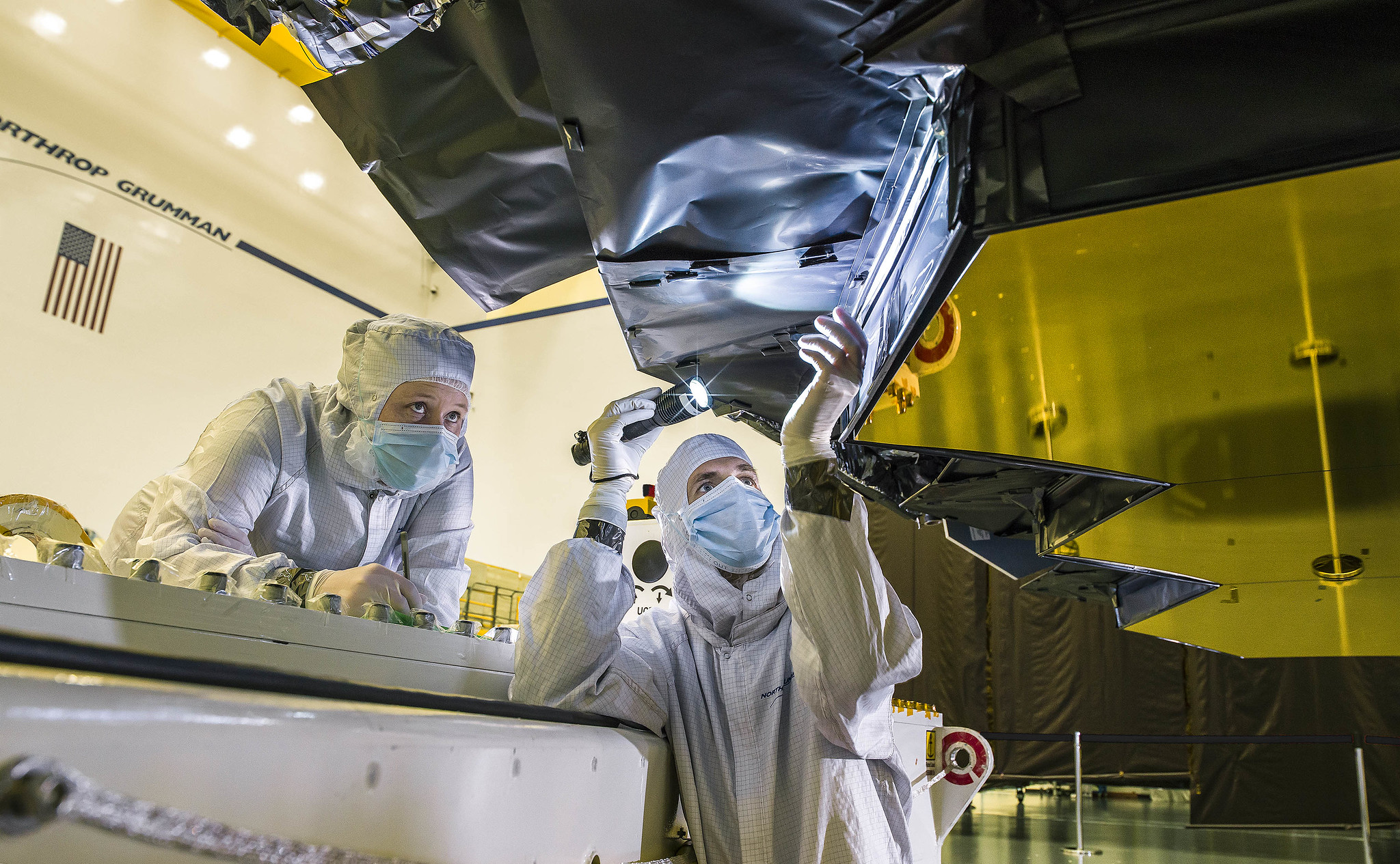 The primary mirror engineering design unit is inspected.