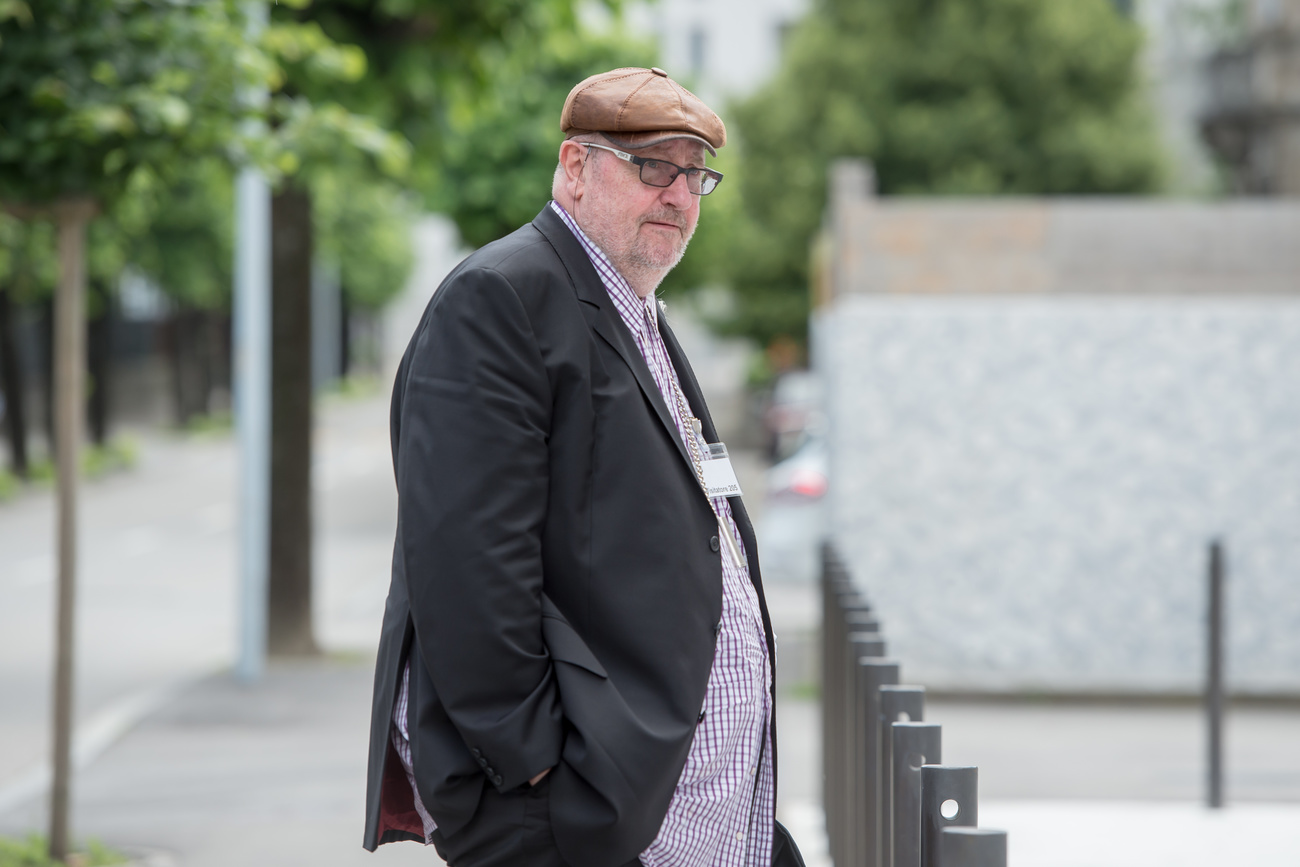 Convicted fraudster Dieter Behring standing outside a Swiss courthouse in 2016.